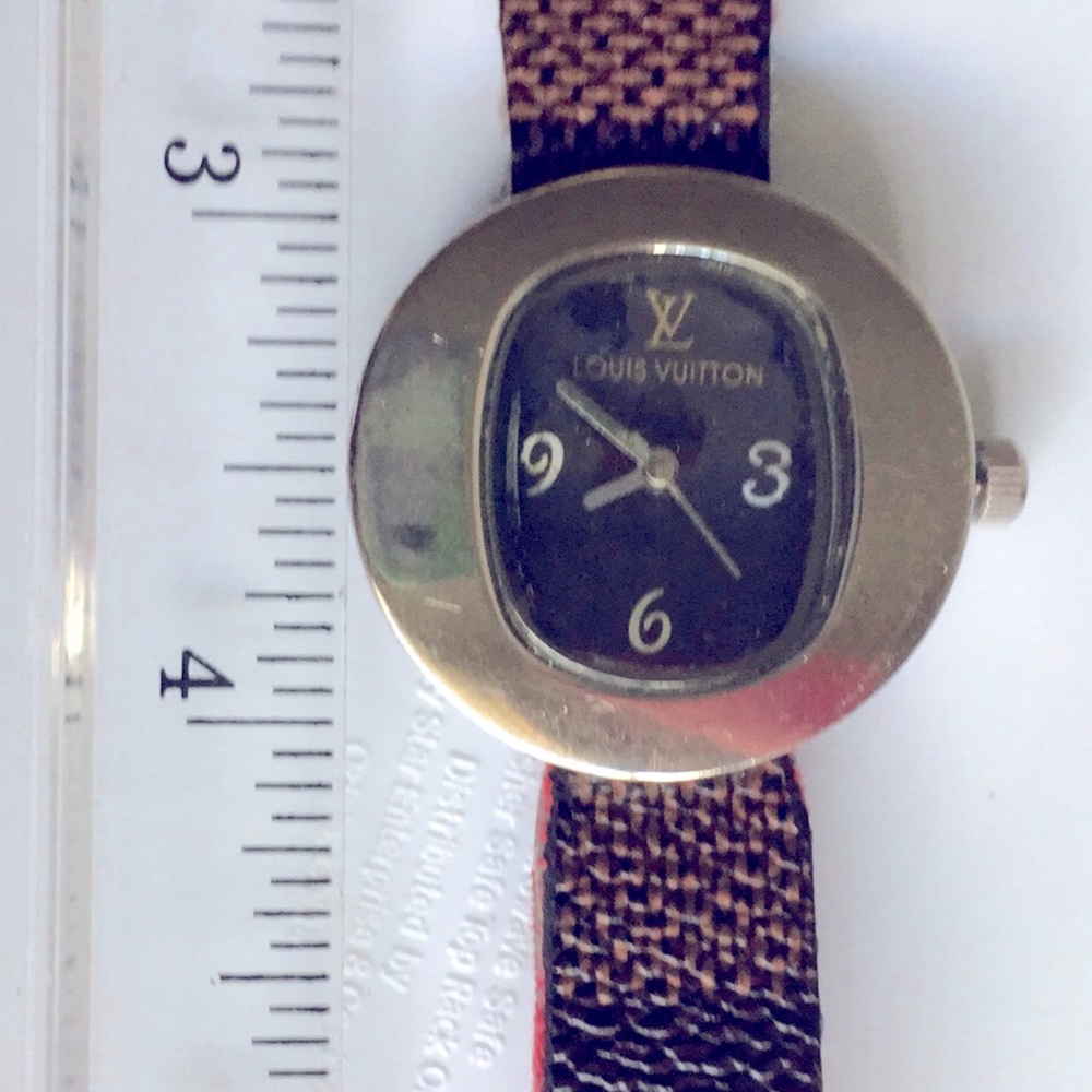 Louis Vuitton Vintage Specimen watch.  Round face